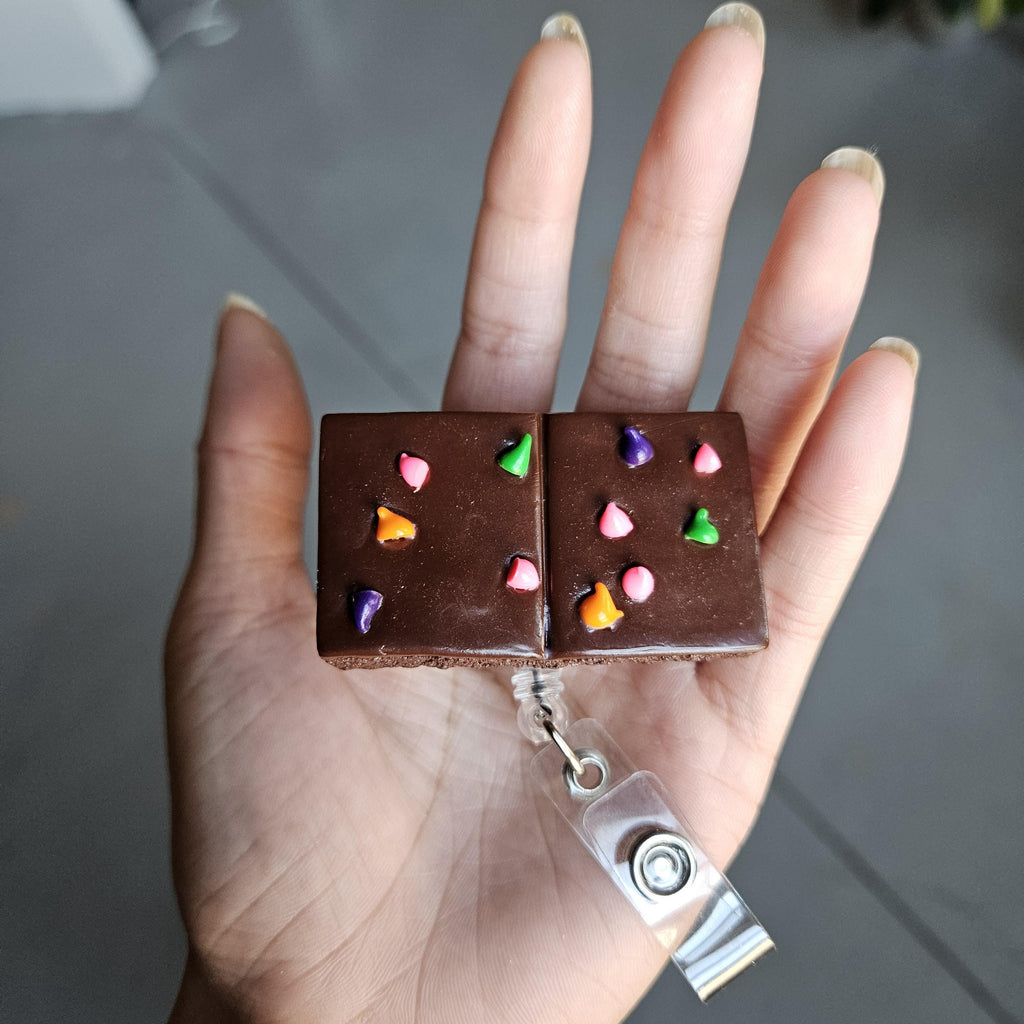 Cosmic Brownie Badge Reel - Sweet and Stylish ID Holder